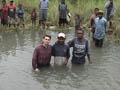 Mark with a few getting baptized.
